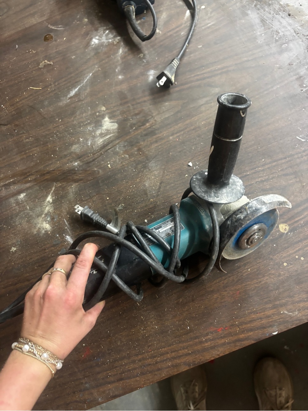 Corded Angle Grinder in Teal and Black